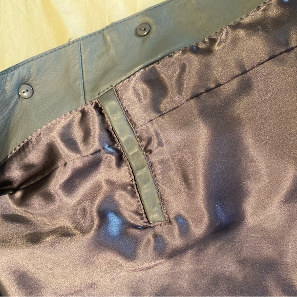 Well made 100% Leather trench coat. Lots of high end details. Size Small. - Picture 8 of 10